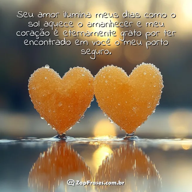 Corações laranjas refletidos em superfície espelhada, simbolizando amor e frescor ao amanhecer.