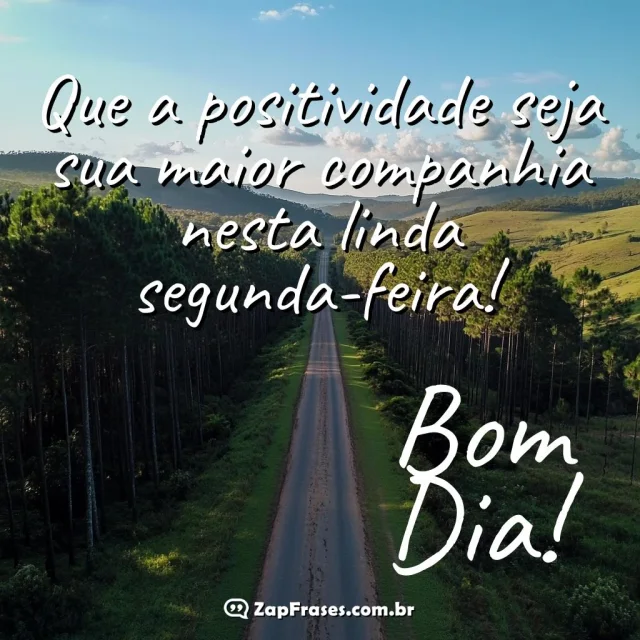 Estrada verde entre árvores, simbolizando um novo começo com a frase: Que a positividade seja sua maior companhia nesta linda segunda-feira!